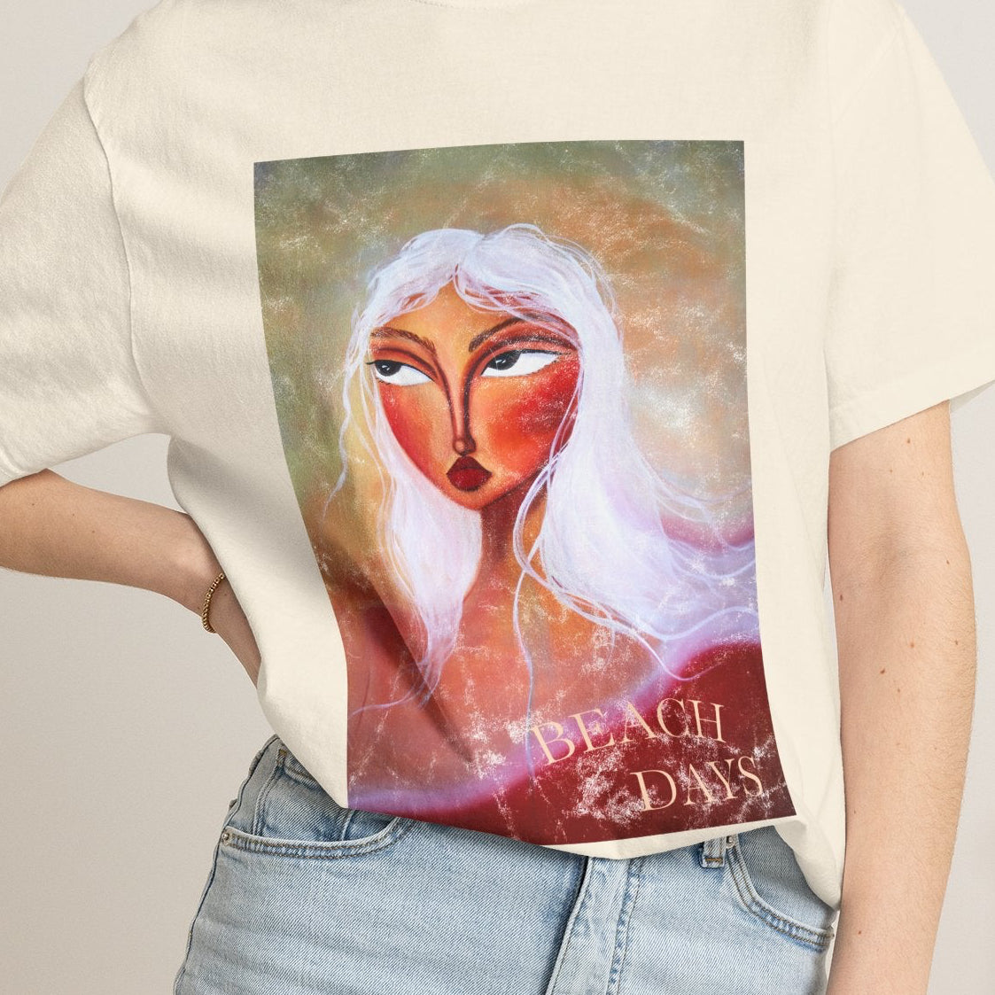 Light blue "Beach Days - Let's Look for Shells" T-shirt by Printify featuring a beach and shell design on the front.